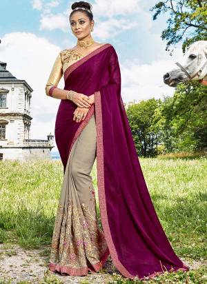 Add This Lovely Shade To Your Wardrobe In Silk Georgette Based Fabric. This Pretty Wine And Grey Colored Saree Is Paired With Beige Colored Blouse. Buy This Designer Saree Now.