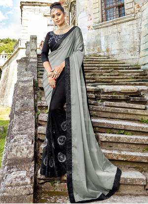 For A Bold And Beautiful Look, Grab This Designer Saree In Silk Georgette Based Saree With Bold Color Pallete. This Designer Saree Is In Grey And Black Color Paired With Black Colored Blouse. This Saree Is Light Weight And Easy To Drape. Buy Now. 