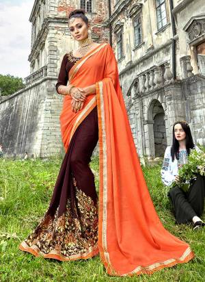 Orange Color Induces Perfect Summery Appeal To Any outift, So Grab This Designer Saree In Orange And Brown Color Paired with Brown Colored Blouse. This Saree IS Fabricated On Silk And Georgette Paired With Art Silk Fabricated Blouse. 