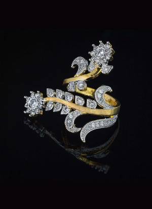 Give A Very Pretty Look To Your Soft Beautiful Hands With This Lovely Designer Ring In Golden Color Beautified With Lovely Diamond Work. This Pretty Ring Can Be Paired With Any Colored Attire. Buy Now.