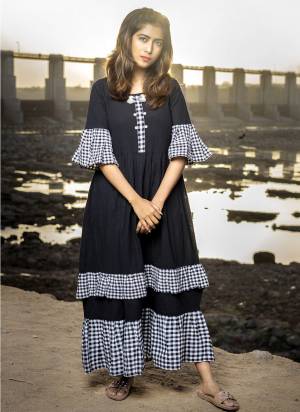 This linen long maxi casual dress has Black checks frill twice and an umbrella?silhouette. 
elbow length pleated sleeves suits the dress. khadi is a fabric that will keep you cool in 
summers and warm in winters. So this dress suits to wear in all seasons.party and casual