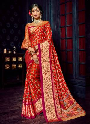 Stand out from the rest of the crowd wearing this Orange coloured saree from, Made of brasso chiffon, this saree is quite comfortable to wear. The subtle woven makes this saree look even more beautiful.