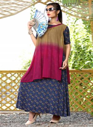 Grab This Designer Readymade Kurti In Blue Color Paired With Pink And Beige Colored Dupatta. This Kurti Is Rayon Fabricated Paired With Georgette Fabricated Dupatta. It Is Light Weight And Easy To Carry All Day Long.