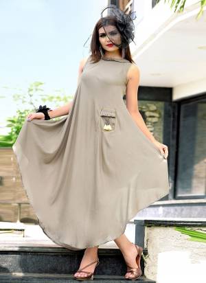 Flaunt Your Rich And Elegant Taste Wearing This Designer Readymade Kurti In Grey Color Fabricated On Rayon. Its Pretty Pattern And Elegant Color Will Earn You Lots Of Compliments From Onlookers. Buy Now.
