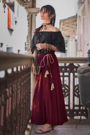 Trendy And Classy Are Two Perfect Word For Todays Generation, Grab This Beautiful Pair In Black Colored Off Shoulder Top Paired With Maroon Colored Bottom .Both Are Khadi Cotton Based Fabric Available In Sizes. 