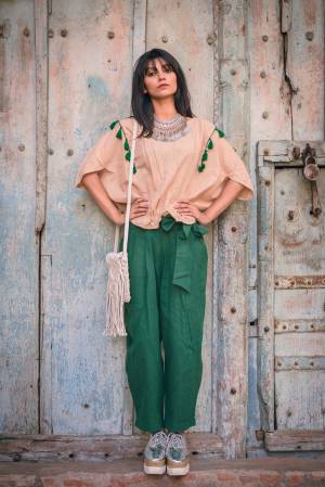 Be It Your College Wear Or For An Outing This Lovely Pair Of Top And Pants Is Suitable For All. Its Top Is In Beige Color Paired With Green Colored Bottom. This Khadi Cotton Based Dress Is Available In Sizes, Choose As Per Your Desired Comfort. Buy Now.