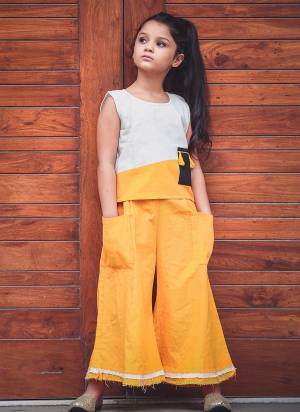 Pretty Simple Pair In Top And Pant Is Here With This White And Yellow Colored Top Paired With Yellow Colored Bottom. This Pair Is Khadi Cotton Based Which Is Suitable For All Season And Ensures Superb Comfort. Buy Now.