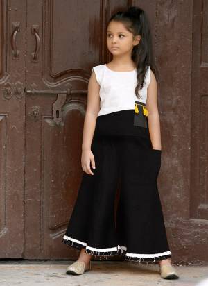 Pretty Simple Pair In Top And Pant Is Here With This White And Black Colored Top Paired With Black Colored Bottom. This Pair Is Khadi Cotton Based Which Is Suitable For All Season And Ensures Superb Comfort. Buy Now.