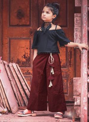 Trendy And Classy Are Two Perfect Word For Todays Generation, Grab This Beautiful Pair In Black Colored Off Shoulder Top Paired With Maroon Colored Bottom .Both Are Khadi Cotton Based Fabric Available In Sizes. 