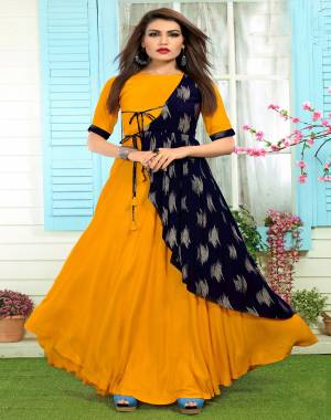 Beautiful Drape Pattern Is Here With This Designer Readymade Kurti In Musturd Yellow And Navy Blue Color Fabricated On Rayon. This Kurti Is Light Weight And easy To Carry All Day Long.
