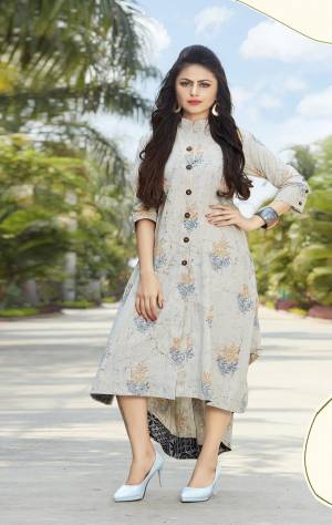 Grab This Pretty Simple and Elegant Looking Designer Readymade Kurti In Off-White Color Fabricated On Cotton Beautified With Prints All Over. It Is Available In Many Sizes. Buy Now.