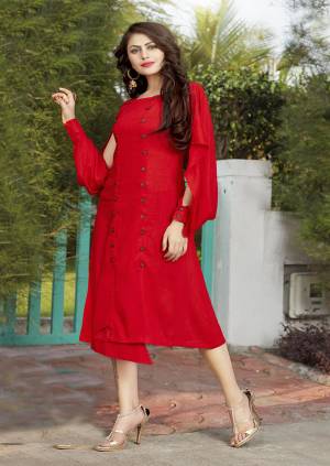 Bright And Visually Appealing Color IS Here With Quite Trendy Pattern In Red Color. This Readymade Kurti IS Fabricated On Rayon. It Is Light Weight And Easy To Carry All Day Long.