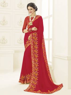 Flaunt a new ethnic look wearing this red color georgette saree. this party wear saree won't fail to impress everyone around you. this gorgeous saree featuring a beautiful mix of designs. Its attractive color and designer heavy embroidered design, Flower patch design, stone design, beautiful floral design work over the attire & contrast hemline adds to the look. Comes along with a contrast unstitched blouse.