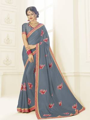 you Look striking and stunning afler wearing this Dark  grey color bright georgette saree. look gorgeous at an upcoming any occasion wearing the saree. this party wear saree won't fail to impress everyone around you. Its attractive color and designer heavy embroidered design, Flower patch design, stone design, beautiful floral design work over the attire & contrast hemline adds to the look. Comes along with a contrast unstitched blouse.