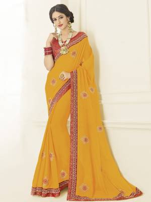 You can this amazing saree and look pretty like never before. wearing this Yellow color moss chiffon saree. this gorgeous saree featuring a beautiful mix of designs. look gorgeous at an upcoming any occasion wearing the saree. Its attractive color and designer heavy embroidered design, Flower patch design, stone design, beautiful floral design work over the attire & contrast hemline adds to the look. Comes along with a contrast unstitched blouse.