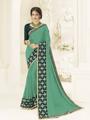 Presenting this sea green color silk fabrics saree. look gorgeous at an upcoming any occasion wearing the saree. this party wear saree won't fail to impress everyone around you. Its attractive color and designer heavy embroidered design, Flower patch design, stone design, beautiful floral design work over the attire & contrast hemline adds to the look. Comes along with a contrast unstitched blouse.