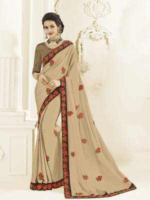 Change your wardrobe and get classier outfits like this gorgeous beige color bright georgette saree. Ideal for party, festive & social gatherings. this gorgeous saree featuring a beautiful mix of designs. Its attractive color and designer heavy embroidered design, Flower patch design, stone design, beautiful floral design work over the attire & contrast hemline adds to the look. Comes along with a contrast unstitched blouse.