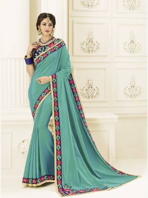 Show your elegance by wearing this gorgeous Blue color two tone silk saree. Ideal for party, festive & social gatherings. this gorgeous saree featuring a beautiful mix of designs. Its attractive color and designer heavy embroidered design, Flower patch design, stone design, beautiful floral design work over the attire & contrast hemline adds to the look. Comes along with a contrast unstitched blouse.