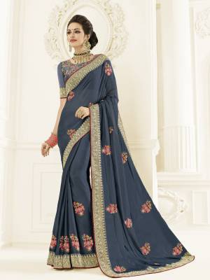 Attractively Gorgeous mesmerizing is what you will look at the next wedding gala wearing this beautiful Steel Blue color bright georgette saree. Ideal for party, festive & social gatherings. this gorgeous saree featuring a beautiful mix of designs. Its attractive color and designer heavy embroidered design, Flower patch design, stone design, beautiful floral design work over the attire & contrast hemline adds to the look. Comes along with a contrast unstitched blouse.