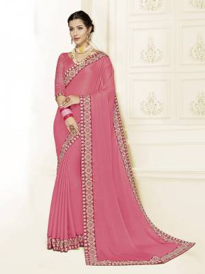 Get this amazing saree and look pretty like never before. wearing this pink color moss chiffon saree. Ideal for party, festive & social gatherings. this gorgeous saree featuring a beautiful mix of designs. Its attractive color and designer heavy embroidered design, Flower patch design, stone design, beautiful floral design work over the attire & contrast hemline adds to the look. Comes along with a contrast unstitched blouse.