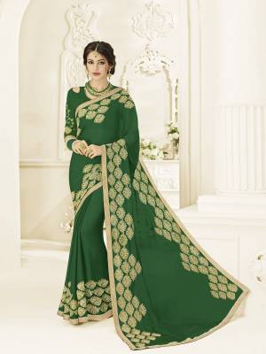 Flaunt your gorgeous look wearing this green color moss chiffon saree. Ideal for party, festive & social gatherings. this gorgeous saree featuring a beautiful mix of designs. Its attractive color and designer heavy embroidered design, Flower patch design, stone design, beautiful floral design work over the attire & contrast hemline adds to the look. Comes along with a contrast unstitched blouse.