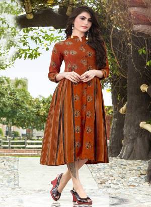 New And Unique Shade Is Here To Add Into Your Wardrobe with This Designer Readymade Kurti In Rust Color Fabricated On Rayon. Buy This Kurti Now.