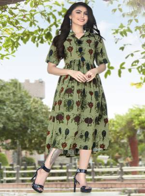 Look Pretty Wearing This Designer Readymade Kurti In Light Green color Fabricated On Rayon Beautified With Prints. This Fabric Is Soft Towards Skin And Easy To Carry All Day Long.
