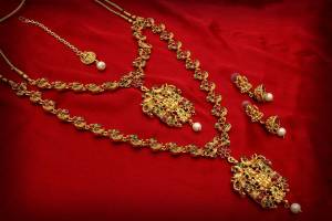 Grab This Pretty Heavy Necklace Set To Pair Up With Your Ethnic Attire. This Set Comes With Two Necklaces Which Can Be Used Sperately As Per The Occasion. It Is Beautified With Stone Work Making It More Attractive. Buy This Lovely Double Necklace Set Now.