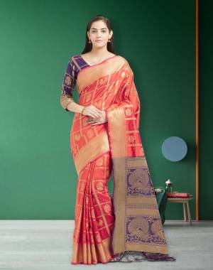 Orange Color Induces Perfect Summery Appeal To Any Outfit, So Grab This Silk Saree Paired With Purple Colored Blouse. This Saree And Blouse Are Fabricated On Art Silk Beautified With Weave All Over.  Buy Now.