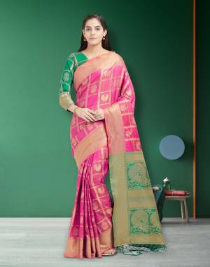 Look Pretty In This Lovely Pink Colored Saree Paired With Contrasting Green Colored Blouse. This Saree And Blouse are Fabricated On Art Silk Beautified With Weave All Over. It Is Light Weight And easy To Drape.