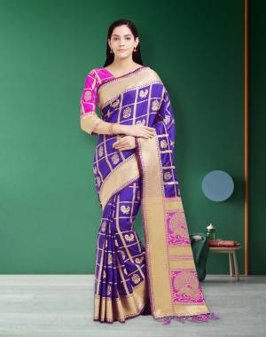 Add This Pretty Dark Shade To Your Wardrobe With This Silk Saree In Violet Color Paired With Contrasting Fuschia Pink Colored Blouse. This Saree And Blouse are Fabricated On Art Silk Beautified With Weave. Buy Now.