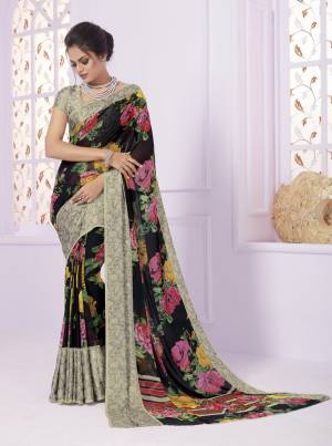 Enhance Your Beauty And Personality Wearing This Saree In Black Color Paired With Grey Colored Blouse. This Saree Is Fabricated On Georgette Paired With Crepe Fabricated Blouse, It Is Beautified with Bold Multi Colored Floral Prints.