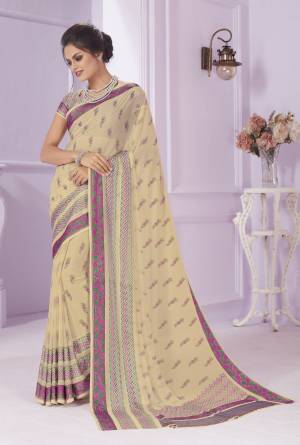 Simple And Elegant Looking Printed Saree Is Here In Cream Color Paired With Multi colored Blouse. This Georgette Based Saree Ensures Superb Comfort And Also It Is Light In Weight Paired With Crepe Fabricated Blouse. 