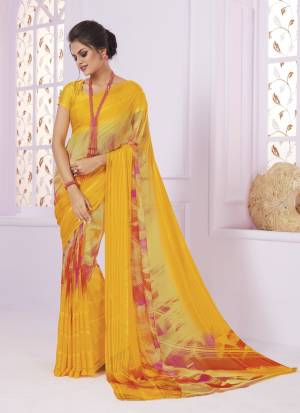Celebrate This Festive Season Wearing This Pretty Saree In Yellow Color Paired With Yellow Colored Blouse. This Saree IS Georgette Based Paired With Crepe Blouse. Both Its Fabrics Are Soft Towards Skin And Easy To Carry All Day Long.
