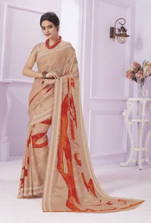 A Must Have Light Shade In Every Womens Wardrobe Is Here With this Saree In Dusty Beige Color Paired With Dusty Beige Colored Blouse. This Saree Is Fabricated On Georgette Paired with Georgette  Fabricated Blouse. Buy This Light Weight Saree Now.