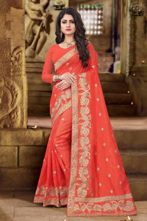 Shine Bright With This Designer Saree In Orange Color Paired With Orange Colored Blouse. This Saree And Blouse are Fabricated On Art Silk Beautified with Jari Embroidery. This Saree Is Easy To Drape And Gives An Elegant Look To Your Personality.