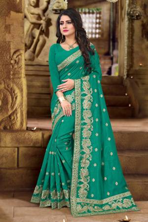 Beautiful Shade In Green Is Here With This Designer Silk Saree In Sea Green color Paired with Sea Green Colored Blouse, This Saree And Blouse Are Fabricated On Art Silk Beautified with Jari Embroidery. Buy This Silk Designer Saree Now.