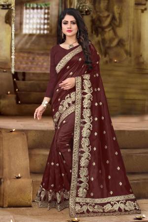You Will Definitely Earn Lots Of Compliments Wearing This Designer Silk Saree In Brown Color Paired With Brown Colored Blouse. This Saree And Blouse Are Fabricated On Art Silk Beautified With Jari Work.