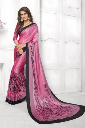 Look Attractive In This Satin Based Saree In Dark Pink Color Paired With Dark Pink Colored Blouse, This Saree And Blouse are Fabricated On Satin Silk Beautified With Black Colored Prints. This Saree Is Light Weight And Soft Towrds Skin And Easy To carry All Day Long. Buy Now.