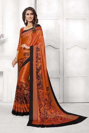 Look Attractive In This Satin Based Saree In Orange Color Paired With Orange Colored Blouse, This Saree And Blouse are Fabricated On Satin Silk Beautified With Black Colored Prints. This Saree Is Light Weight And Soft Towrds Skin And Easy To carry All Day Long. Buy Now.