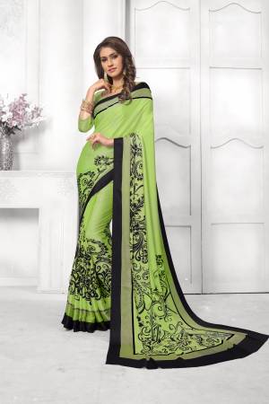 Look Attractive In This Satin Based Saree In Light Green Color Paired With Light Green Colored Blouse, This Saree And Blouse are Fabricated On Satin Silk Beautified With Black Colored Prints. This Saree Is Light Weight And Soft Towrds Skin And Easy To carry All Day Long. Buy Now.