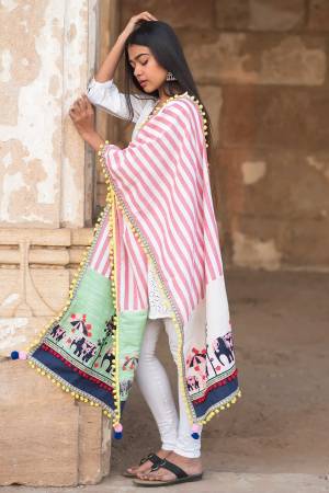 Grab This Beautiful Designer Dupatta In Pink And Green Color Fabricated On Khadi Cotton Beautified with Thread Work And Pom Pom Laces. This Pretty Dupatta Can Be Paired With Any Contrasting Suit Or Can Be Used In Navratri With Your Chaniya Choli.