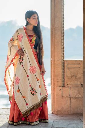 Add This Lovely Designer Dupatta In Cream Color To Your Wardrobe. This Dupatta Is Fabricated On Khadi Cotton Beautified With Thread Work. It Can Be Paired With Any Colored Traditional Attire. Buy Now.
