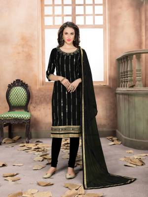 Enhance Your Personality Wearing This Designer Straight Cut Suit In Black Color. Its Top Is Fabricated On Art Silk Paired With Santoon Bottom And Net Dupatta. It Is Beautified With Jari Embroidery And Mirror Work. Buy Now.