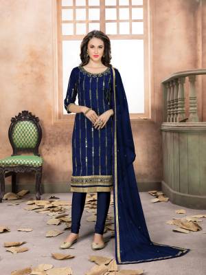 Enhance Your Personality Wearing This Designer Straight Cut Suit In Navy Blue Color. Its Top Is Fabricated On Art Silk Paired With Santoon Bottom And Net Dupatta. It Is Beautified With Jari Embroidery And Mirror Work. Buy Now.