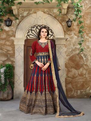 Get Ready For The Upcoming Festive And Wedding Season Wearing This Designer Floor Length Suit In Navy Blue Color Paired With Navy Blue Colored Bottom And Dupatta. It Has Heavy Jari And Contrasting Thread Work. Buy Now.