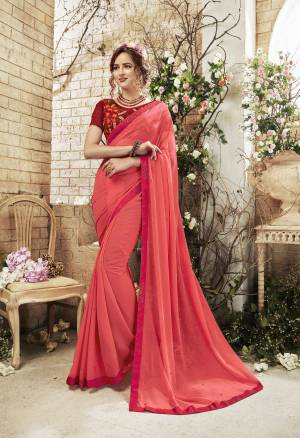 New Shade Is Here With This Designer Old Rose Pink Colored Saree Paired With Contrasting Maroon Colored Blouse. This Saree Is Fabricated On Chiffon Paired With Art Silk Fabricated Blouse. It Is Beautified with Heavy Embroidery Over The Blouse. Buy Now.