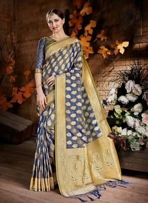 Enhance Your Personality Wearing This Saree In Blue Color Paired With Blue Colored Blouse. This Satee And Blouse Are Fabricated On Cora Art Silk Beautified With Weave All Over. Buy This Saree Now.