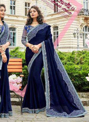 Add This Beautiful Saree To Your Wardrobe In Dark Blue Color Paired With Dark Blue Colored Blouse. This Saree Is Silk Georgette Fabricated Paired With Art Silk And Net Fabricated Blouse. Buy This Designer Saree Now.