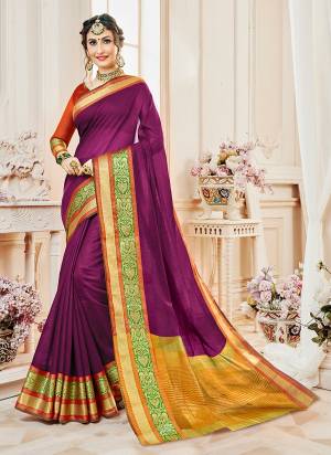 Grab This Pretty Elegant Looking Purple Colored Saree Paired With Contrasting Rust Orange Colored Blouse. This Saree And Blouse Are Fabricated On Cotton Silk Beautified with Weave Over The Border.
